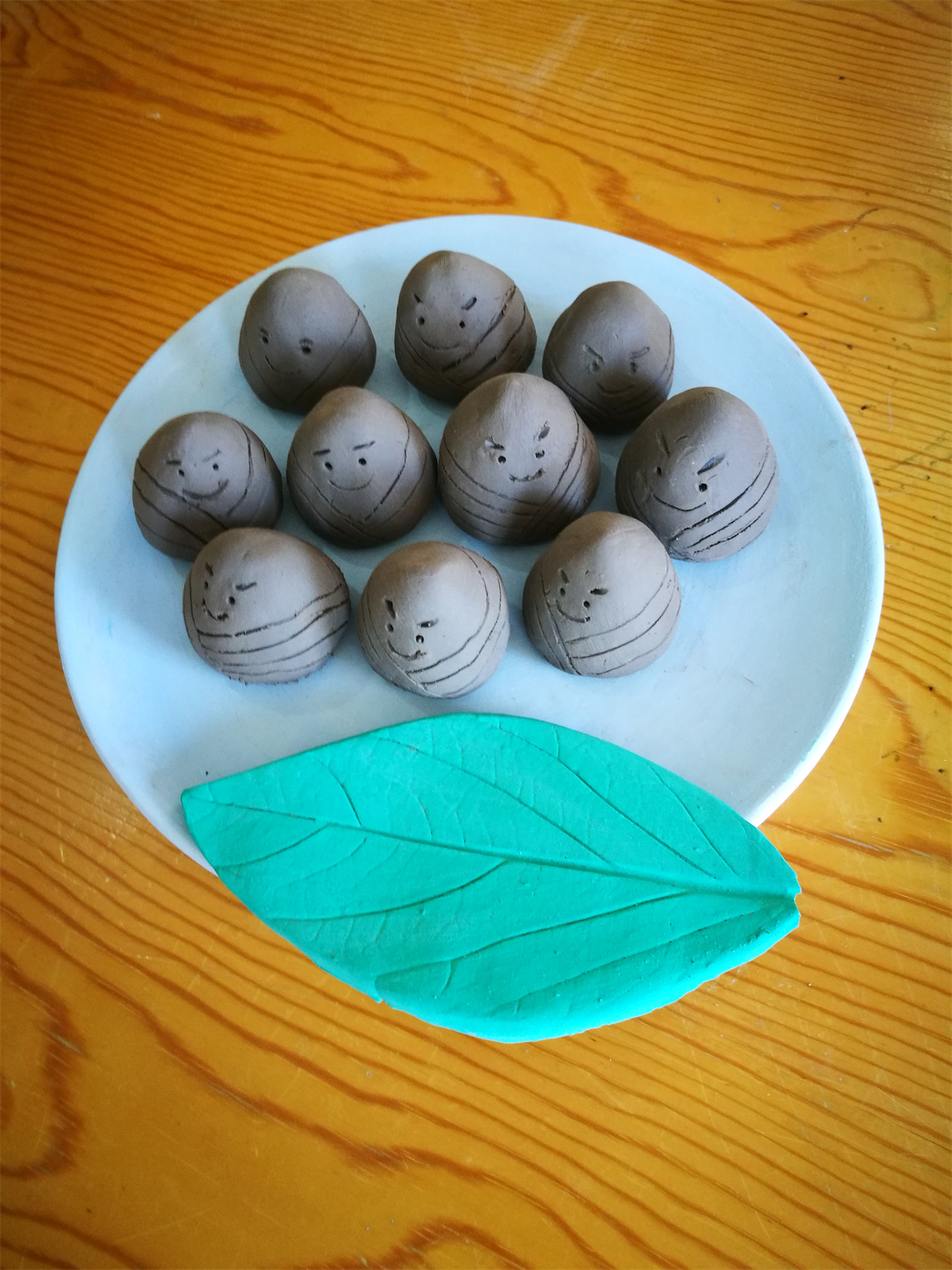 1687343051897686.jpg 樂享端午,文化傳承——盛世長安小學陶藝社團“藝”見“棕”情4.jpg